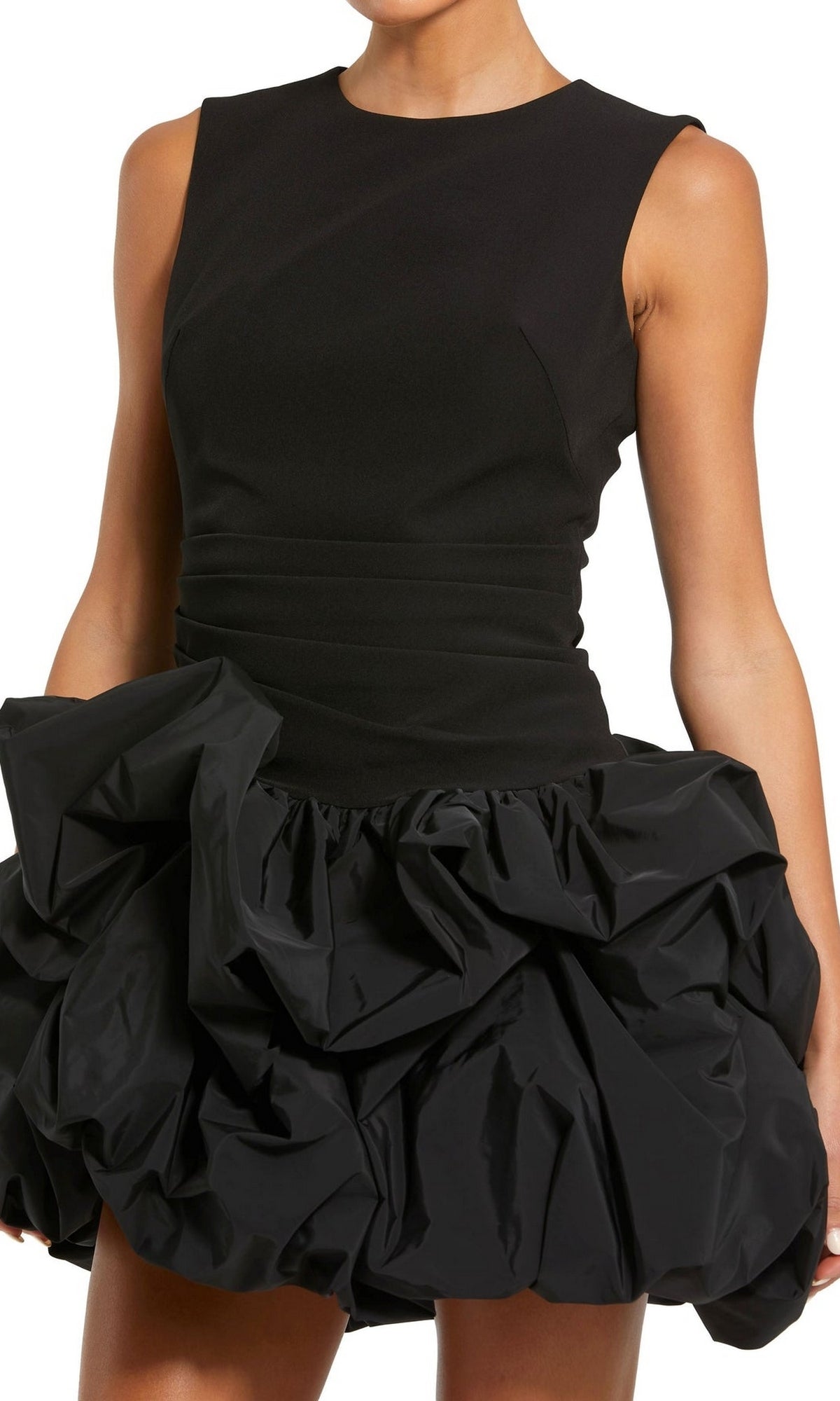 A woman wears the Short Black Bubble Party Dress, Mac Duggal 20709—a chic sleeveless cocktail dress with a fitted bodice and ruffled mini bubble skirt, perfect for any special evening.